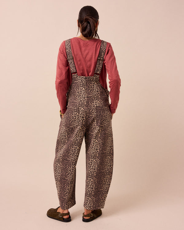 model wears leopard print ottie jumpsuit