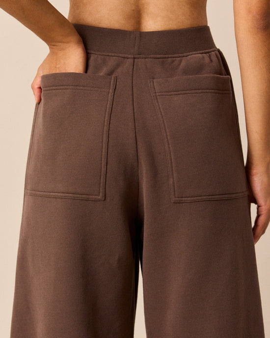 model wears pascale chocolate fleeceback jersey trousers