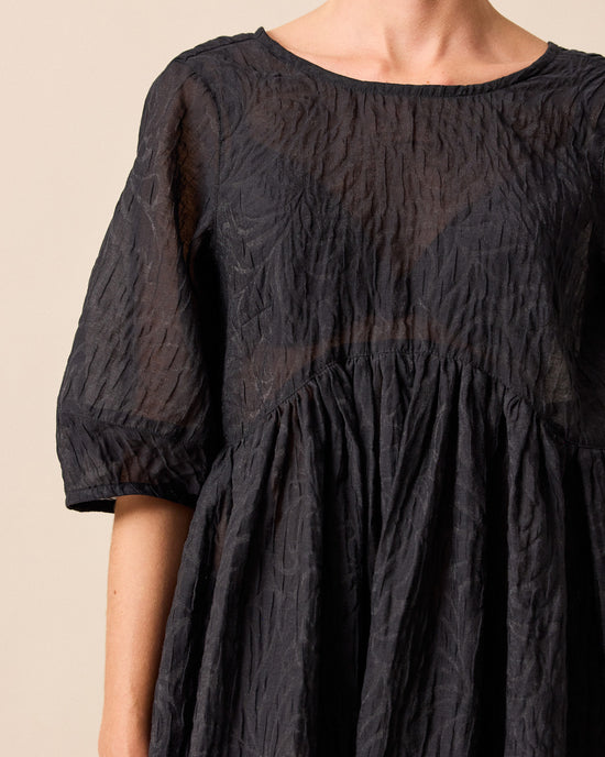 model wears prue organza dress