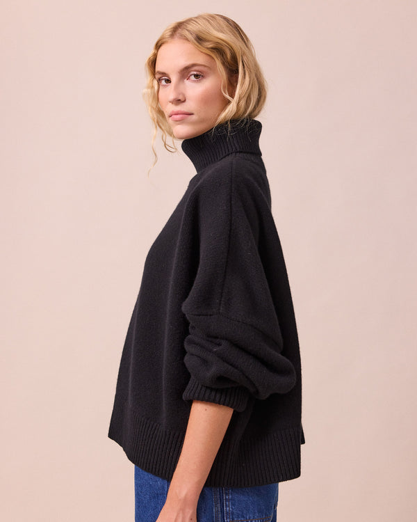 model wears ruth black knitted jumper