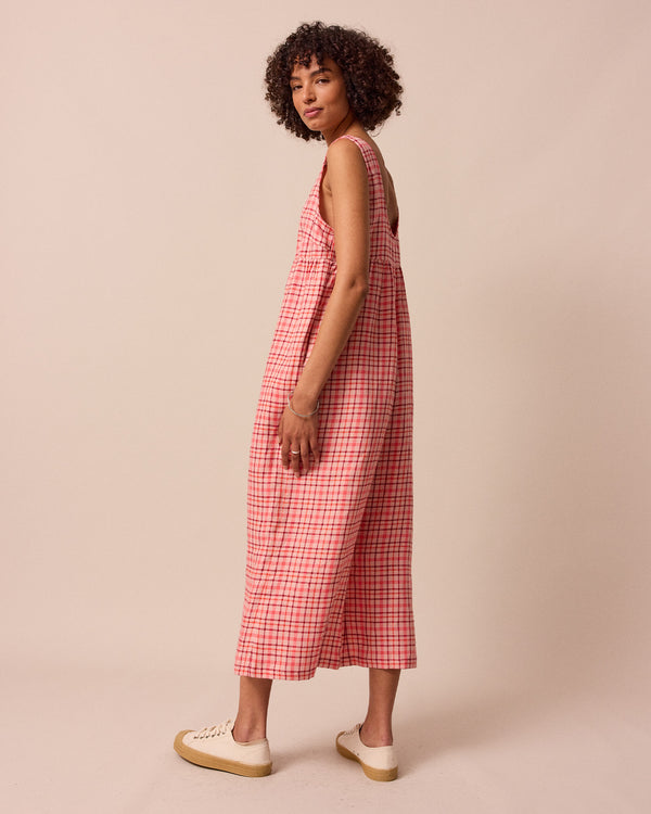 model wears savannah rosewood plaid linen jumpsuit