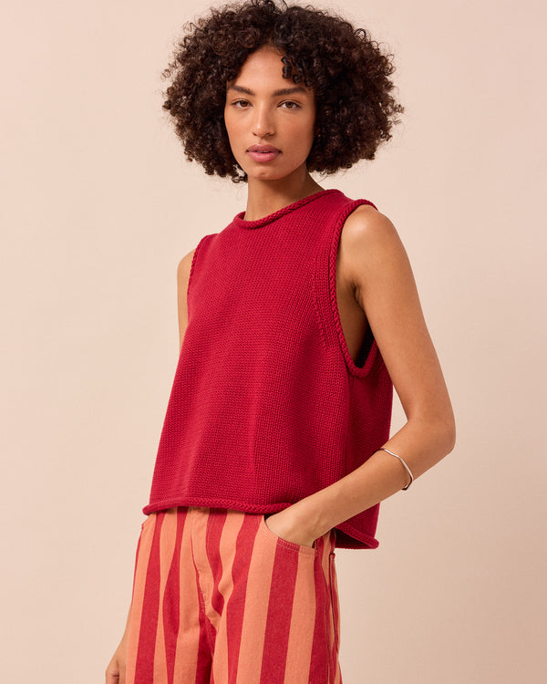 model wears tyler cranberry knitted vest