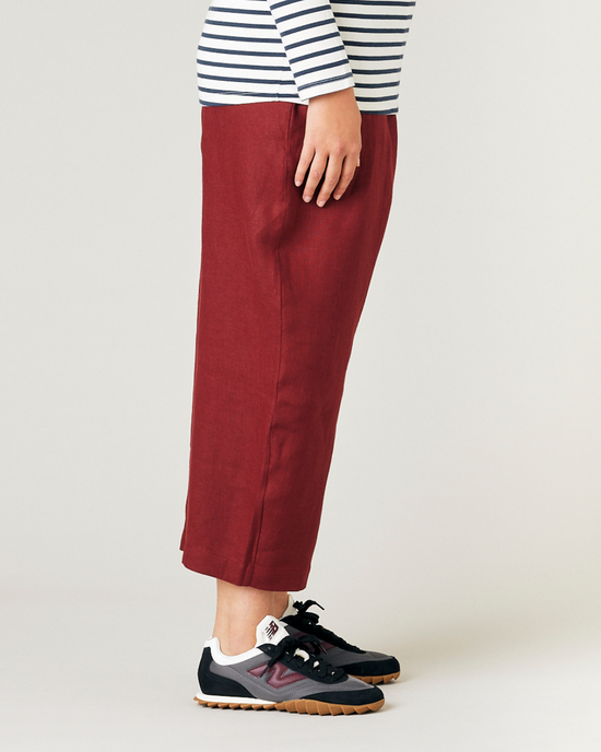 model wears brick linen mabel trousers right