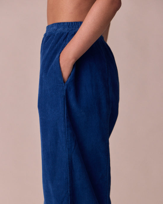 model wears mabel lapis blue cord trousers 