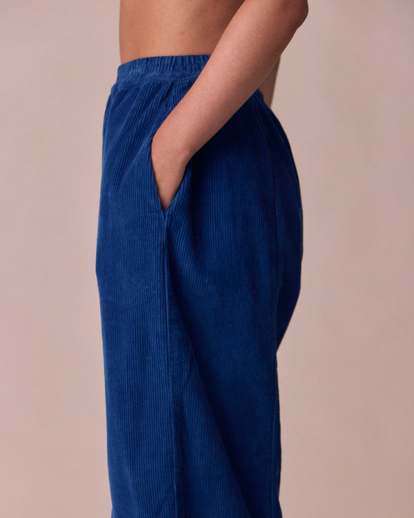 model wears mabel lapis blue cord trousers 