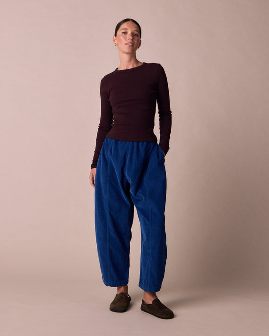 model wears lila beetroot jersey top