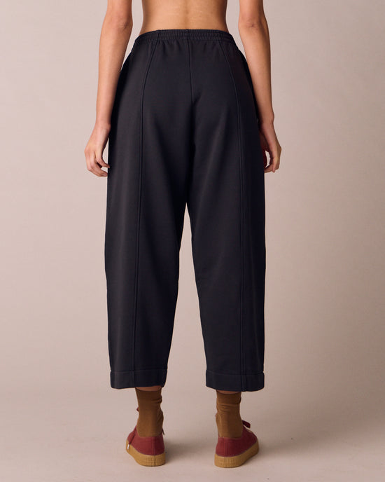 model wears mabel washed black fleeceback jersey trousers back