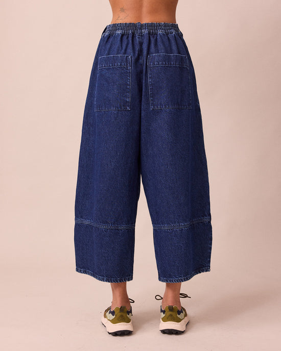 model wears blair dark wash denim jeans back