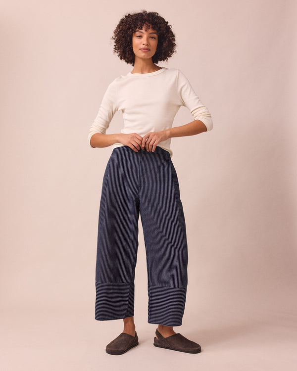 model wears blair navy pinstripe denim jeans right