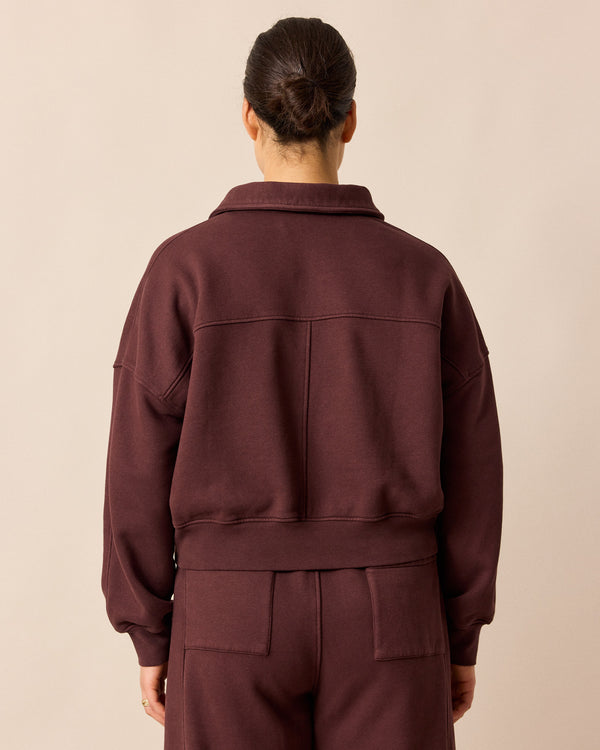 model wears cleo burgundy jersey jumper