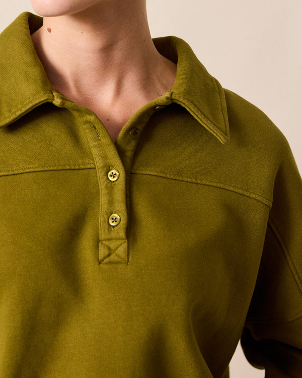 model wears cleo fresh olive jersey jumper