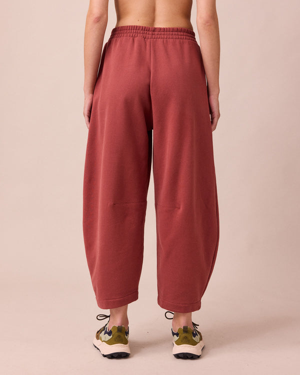 model wears daisy brick fleece jersey trousers back