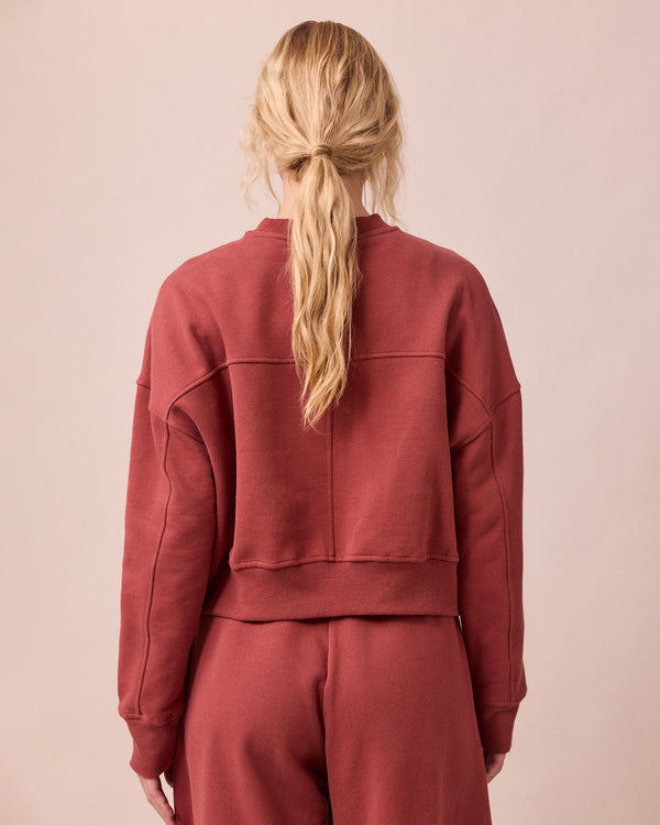 model wears eden brick fleeceback jersey jumper