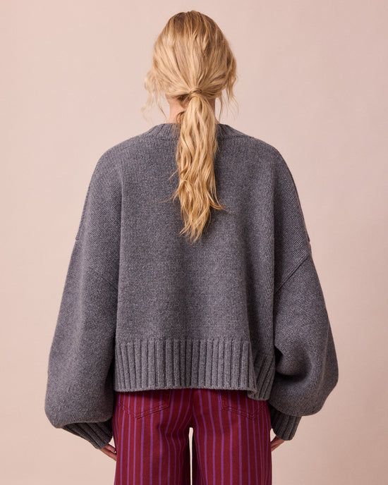 model wears phoebe storm grey knitted jumper