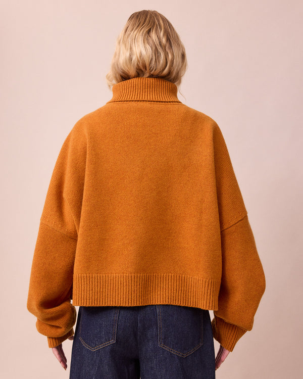 model wears ruth spice knitted jumper