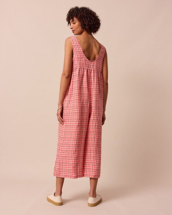 model wears savannah rosewood plaid linen jumpsuit