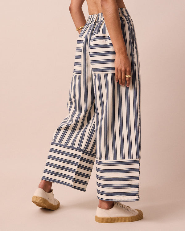 model wears blair sailor stripe denim jeans right