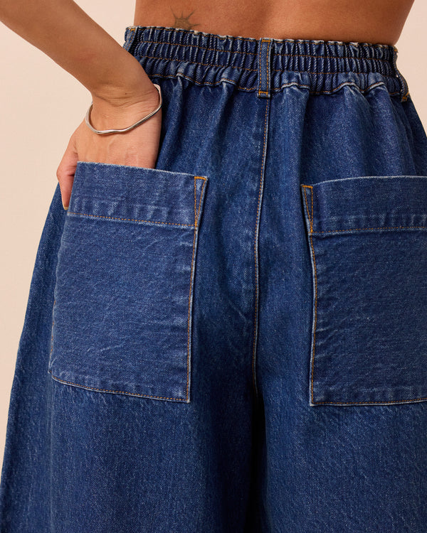 model wears blair mid wash denim jeans right