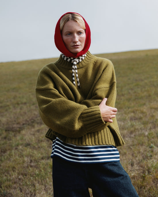model wears kimi moss green knitted jumper