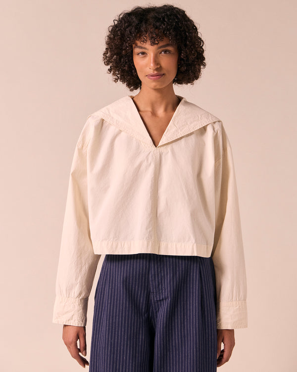 model wears abigail bone poplin top