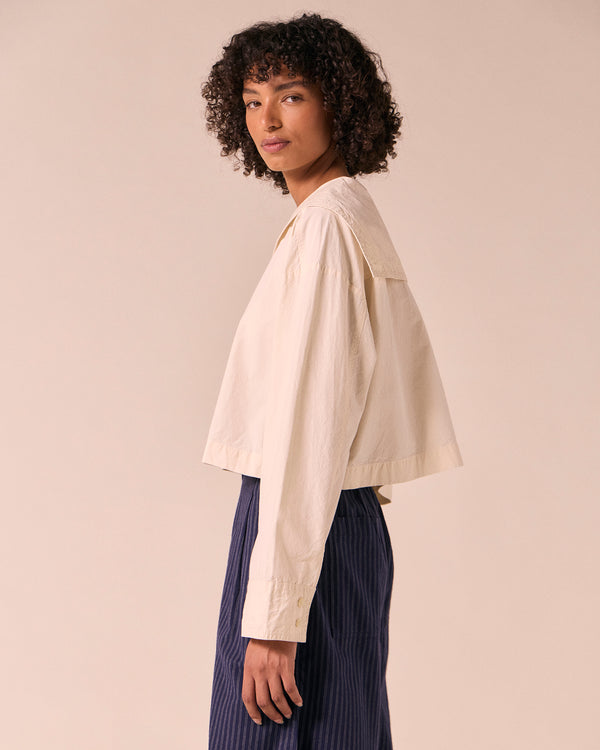 model wears abigail bone poplin top