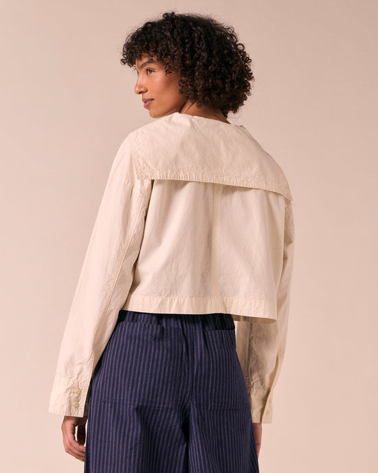model wears abigail bone poplin top