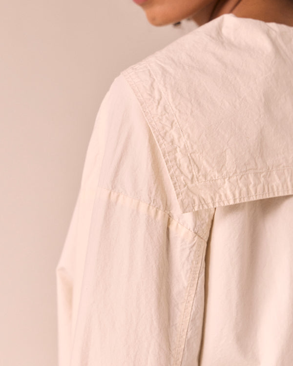 model wears abigail bone poplin top