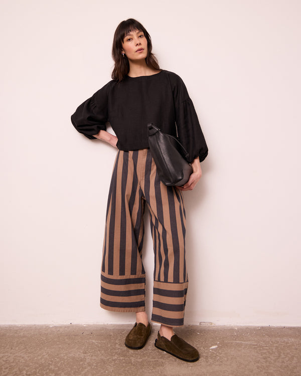 model wears blair graphite and mocha denim jeans