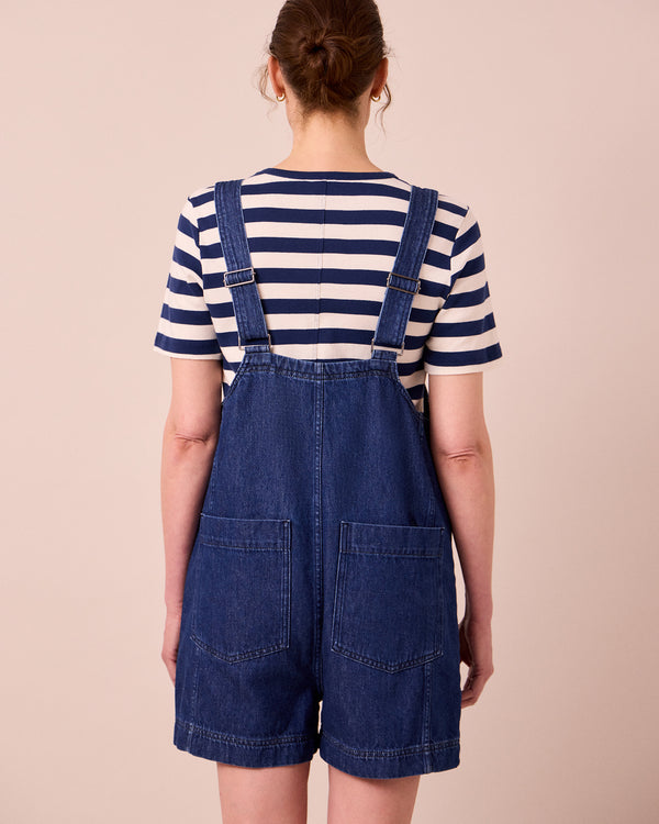 model wears the anica mid blue denim playsuit