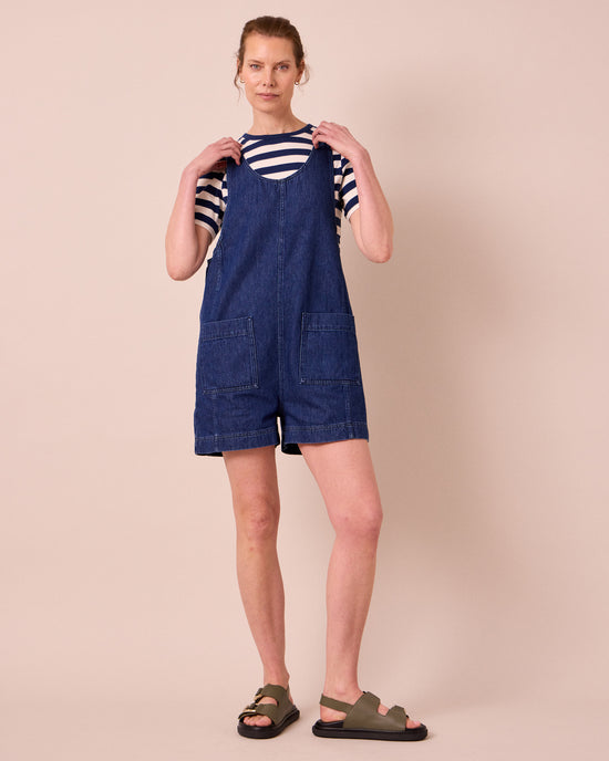 model wears the anica mid blue denim playsuit