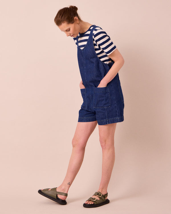 model wears the anica mid blue denim playsuit