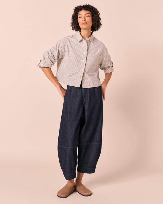 model wears anya blue and bone stripe seersucker shirt