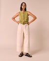 model wears arden ecru denim jeans right