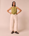 model wears arden ecru denim jeans right