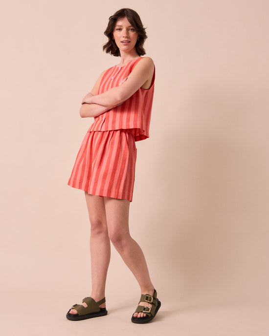 model wears arielle sorbet stripe linen shorts
