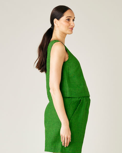 pregnant model wears green and black micro check esme top