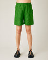 pregnant model wear green and black micro check ari shorts