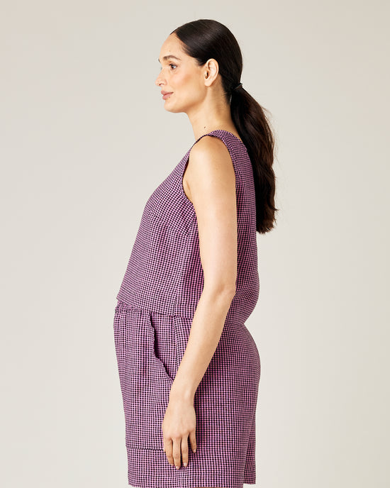 pregnant model wears pink and black micro check linen esme top