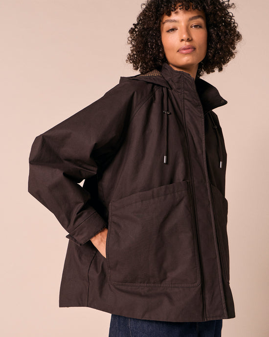 model wears averie ganache coated cotton jacket