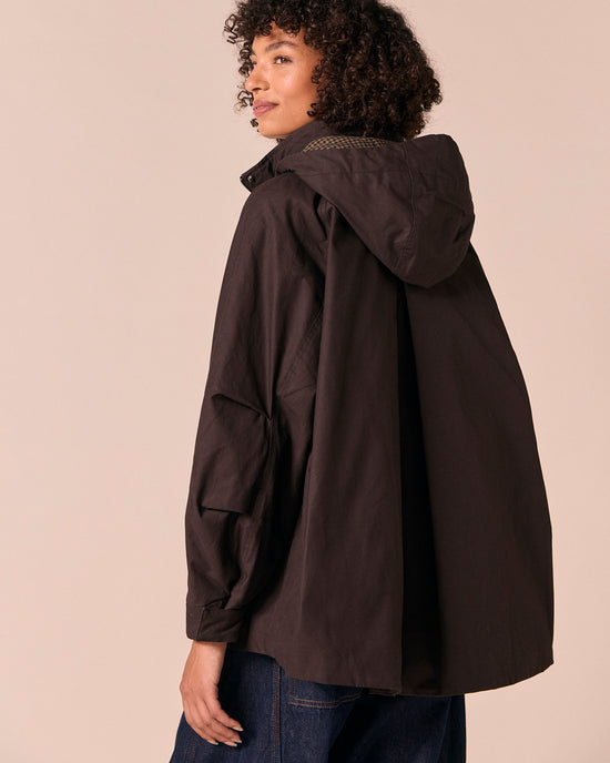 model wears averie ganache coated cotton jacket