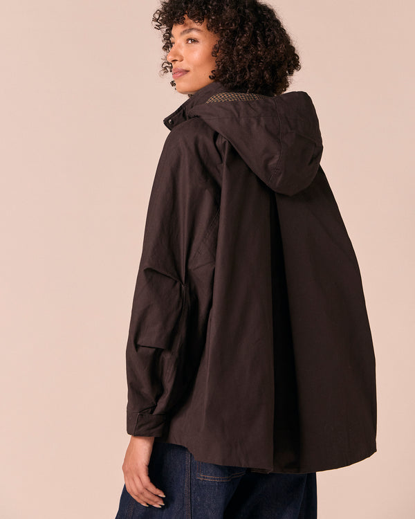 model wears averie ganache coated cotton jacket