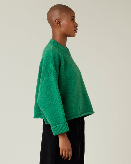 model wears green coco knitted jumper