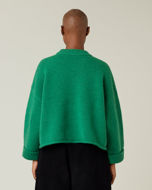 model wears green coco knitted jumper