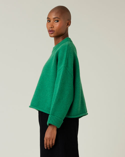 model wears green coco knitted jumper