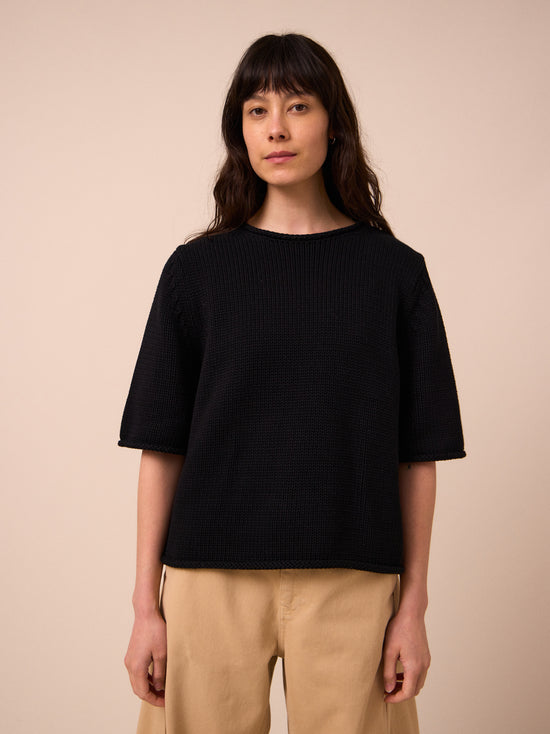 model wears bailey black knitted t-shirt