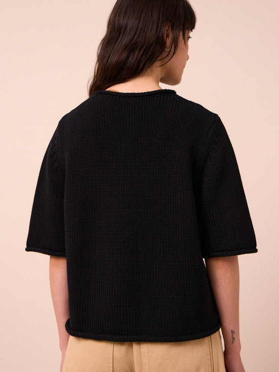 model wears bailey black knitted t-shirt