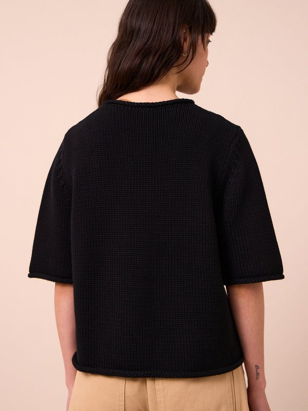 model wears bailey black knitted t-shirt