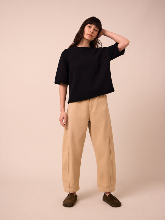 model wears bailey black knitted t-shirt