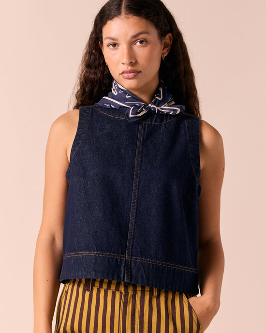 model wears fish print cotton bandana