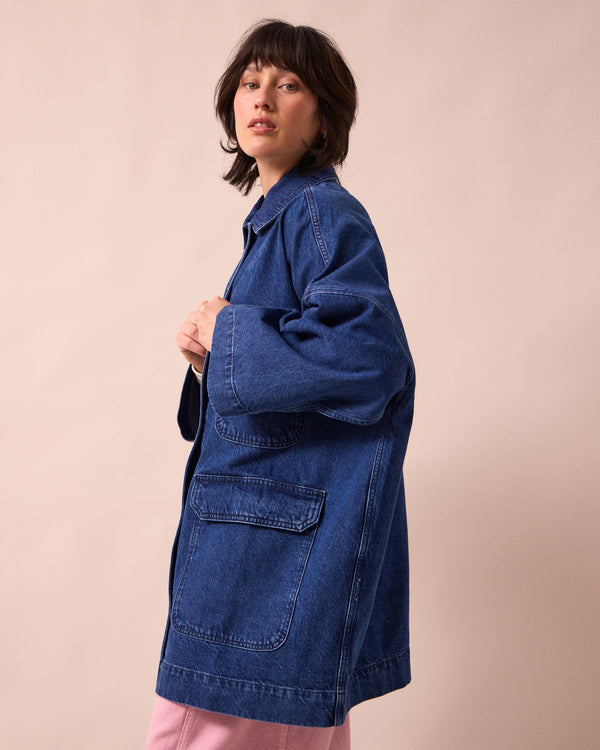 model wears bea mid blue denim jacket